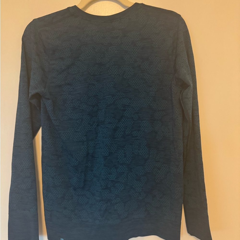 Lululemon Breeze By Long Sleeve
Pacific Teal / Night Diver - Picture 6 of 8